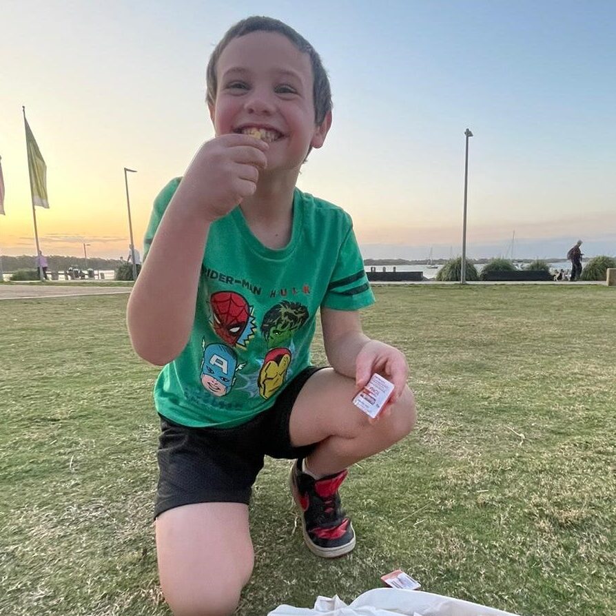 Picture of boy eating fries